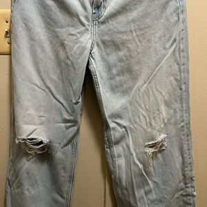Light Wash Woman’s  Ripped Jeans